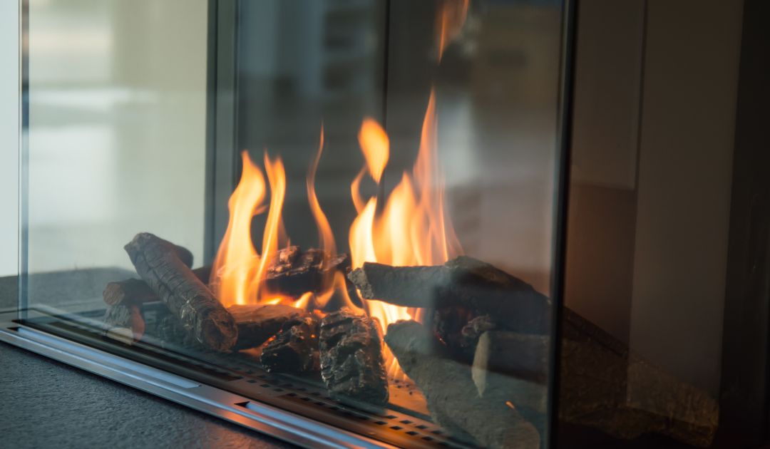 stock photo of a close view of gas flames in a glass gas fireplace